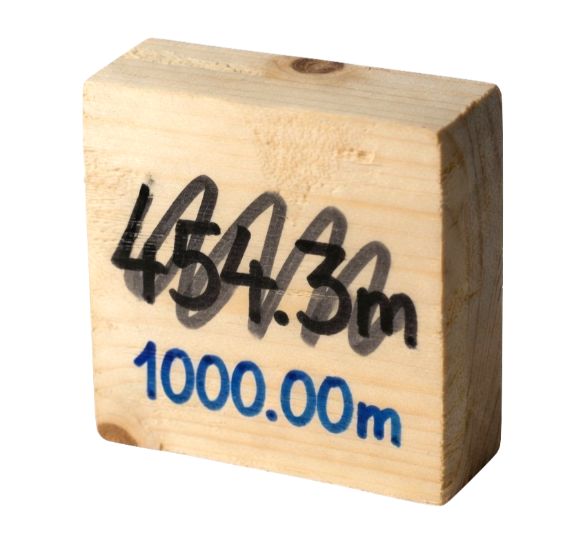Core tag from a high-volume logging project marked at 1000 meters.